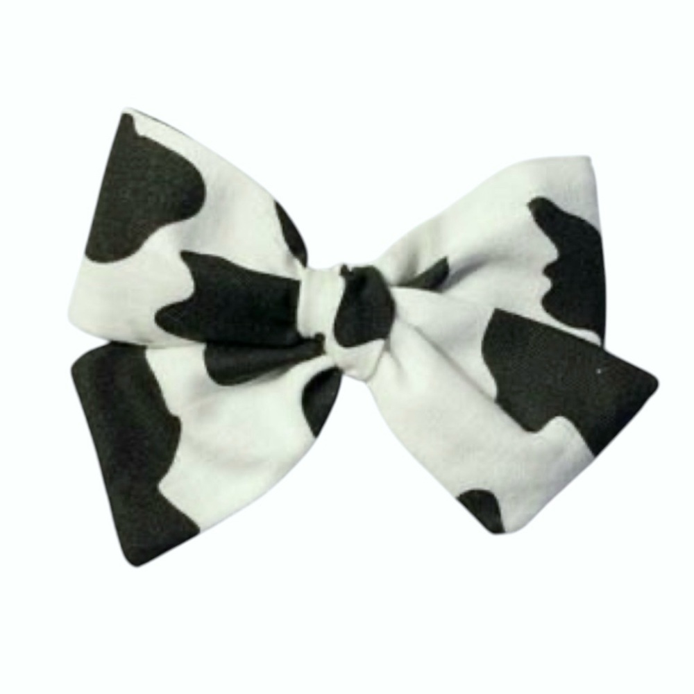 Fireside Cuddles Cow Print Bow Clip